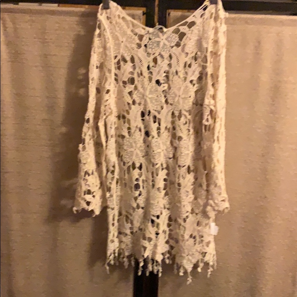 Brand new. Knitted Top. Fits like a small.